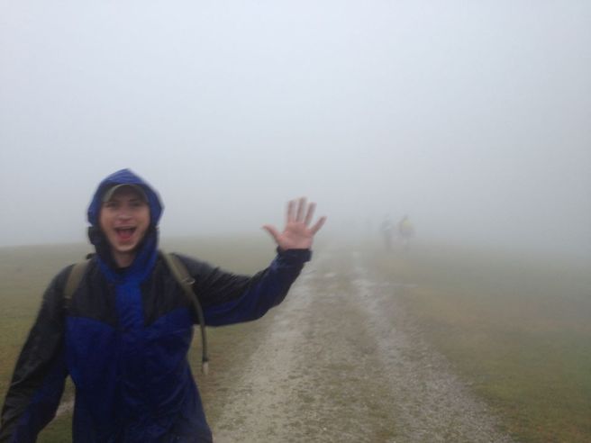 John walking cheerfully through the fog. Photo by Ben Head.
